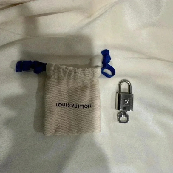 LV Silver Lock and Key in Dust Bag - Picture 1 of 5